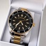 Reloj U.S. Polo Assn. – Deportivo Bicolor Negro/Dorado